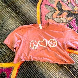 A peace love and volleyball cropped t-shirt